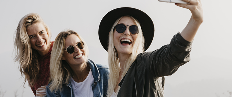 Three young women taking a selfie
