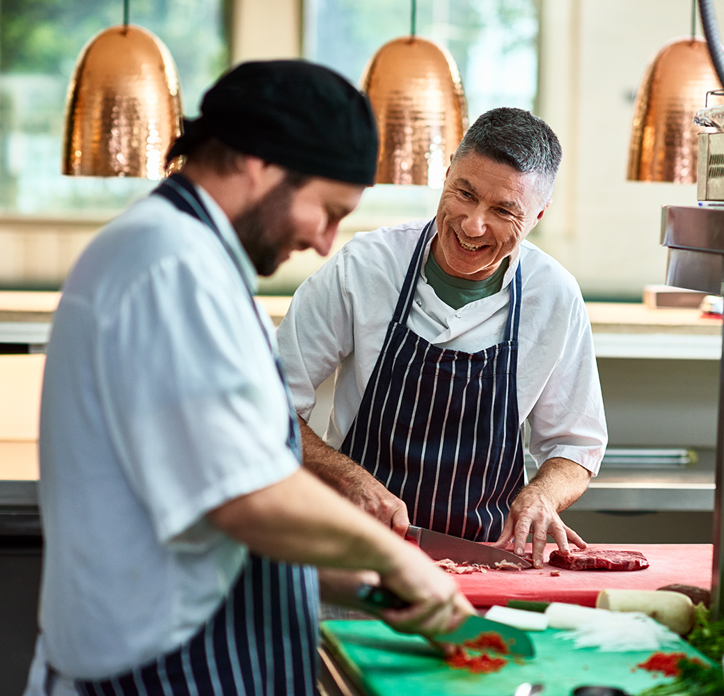 Two male chefs in kitchen