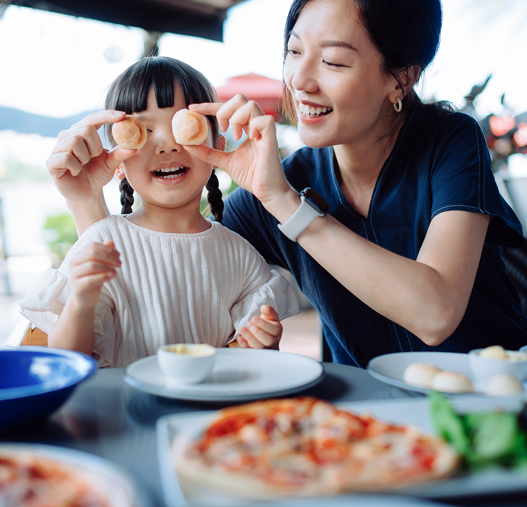 Woman and daughter at restaurant