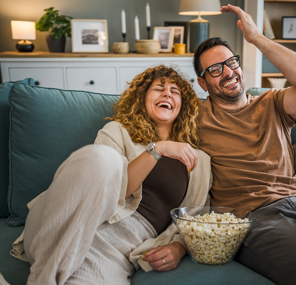 Woman and man on couch