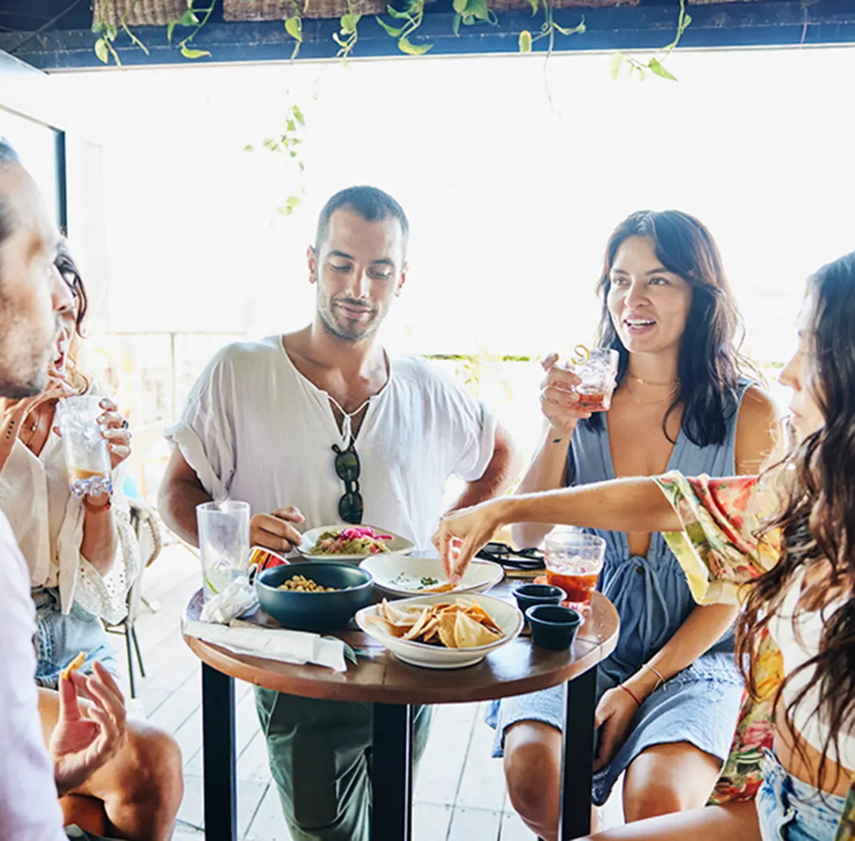 Friends enjoying mexican food