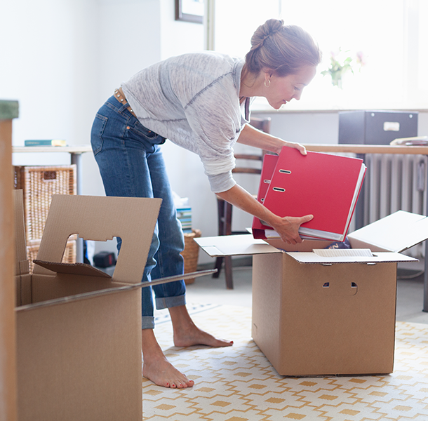 Woman unpacking box